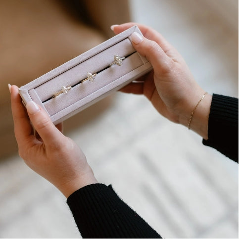 Blakemans Fine Jewelry re-styling service with gemologist expertise, showing jewelry box of diamond rings and trusted care for heirloom and custom designs.